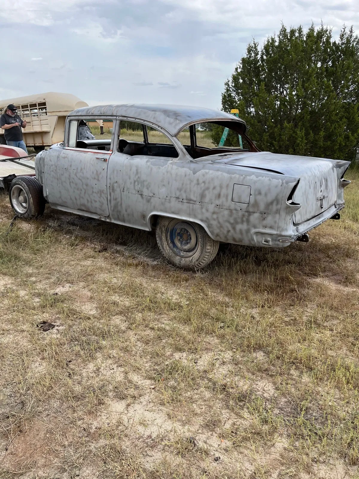 The same 1955 Chevrolet blasted back to even bare metal.